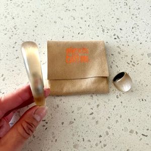 Alexis Bittar bangle & ring set in champagne lucite with light texture.